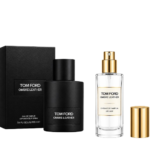 Tom Ford Ombre Leather perfume set featuring a black fragrance bottle, matching box, travel spray, and gold cap.